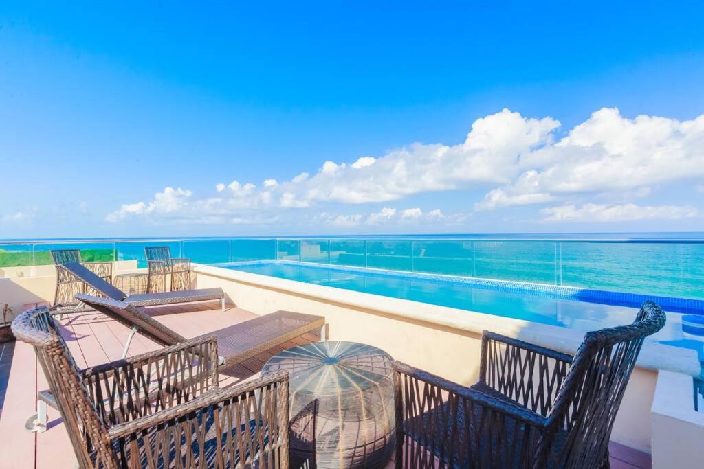 Isla Mujeres Spectacular Oceanfront Luxury Penthouse at 3Bd 3 Bth Private Pool Resort Amenities by MINT Vacation rentals image