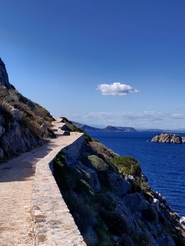 Stone road on the water in Hydra Greece