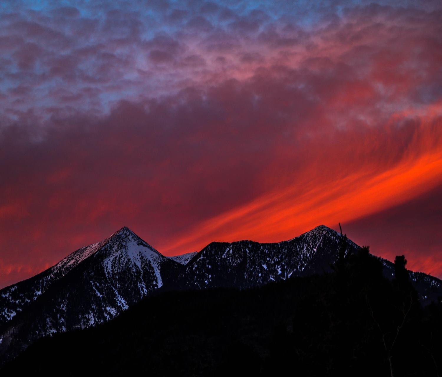 Sunset over snowcapped mountaing in Flagstaff, Arizona